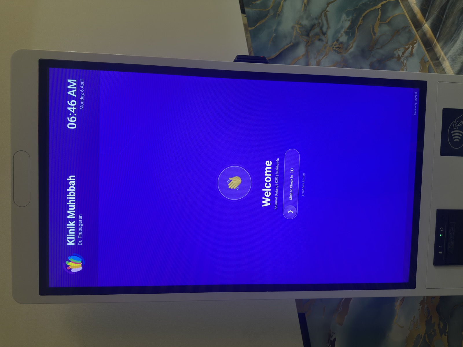 MoVo-X kiosk phone entry screen showing Enter Phone Number at Klinik Muhibbah