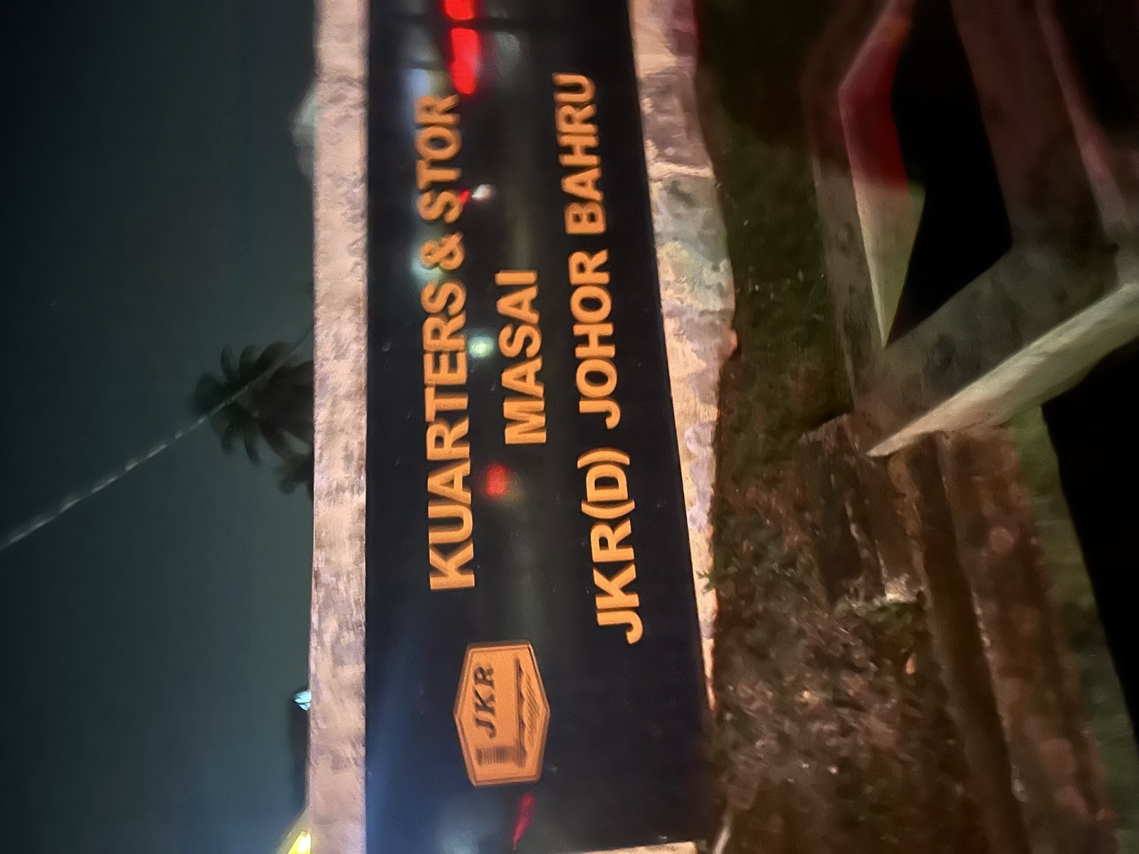 Kuarters and Stor Masai sign at night, Johor Bahru government quarters