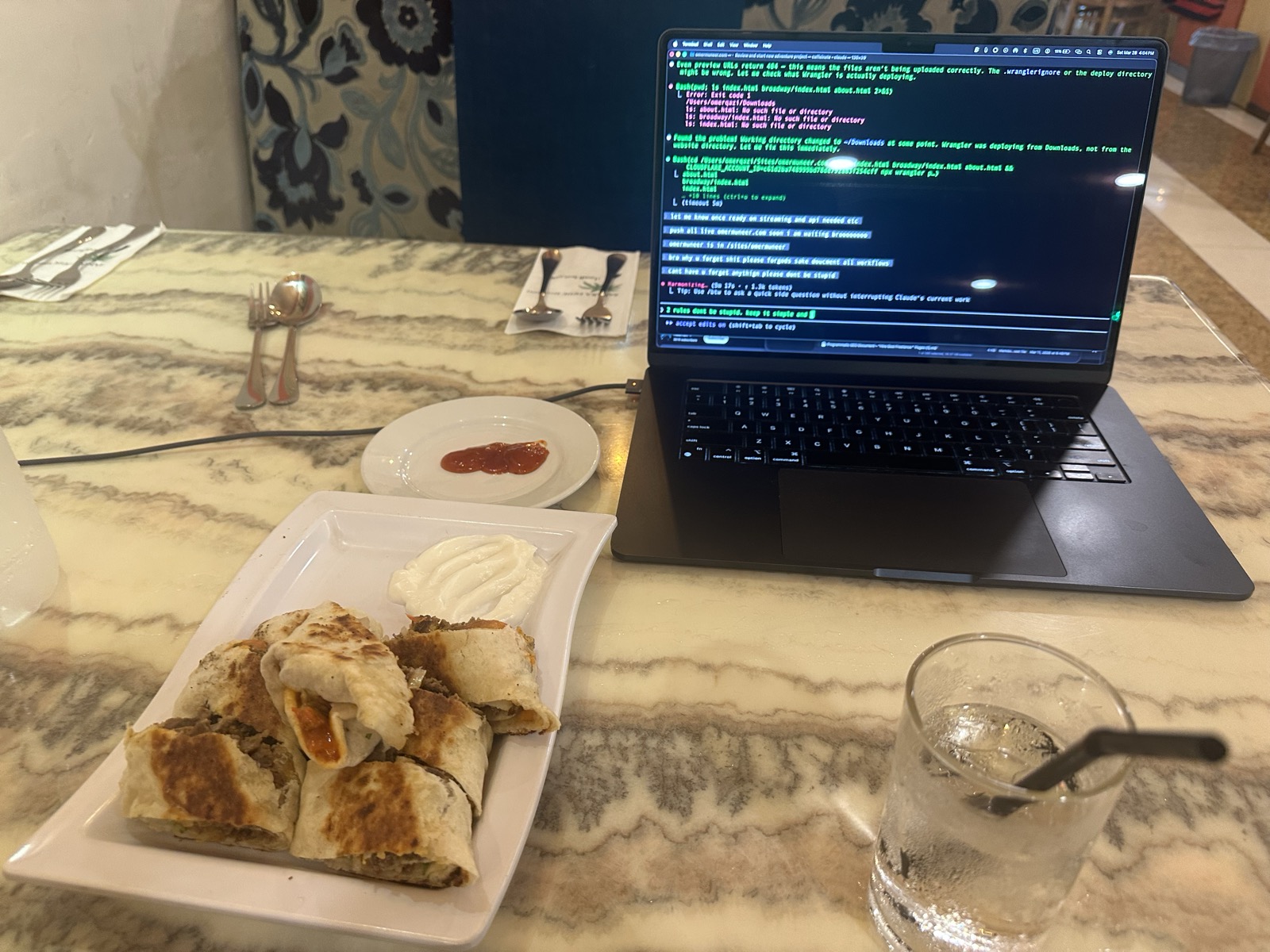 Full lunch setup with spring rolls and cream