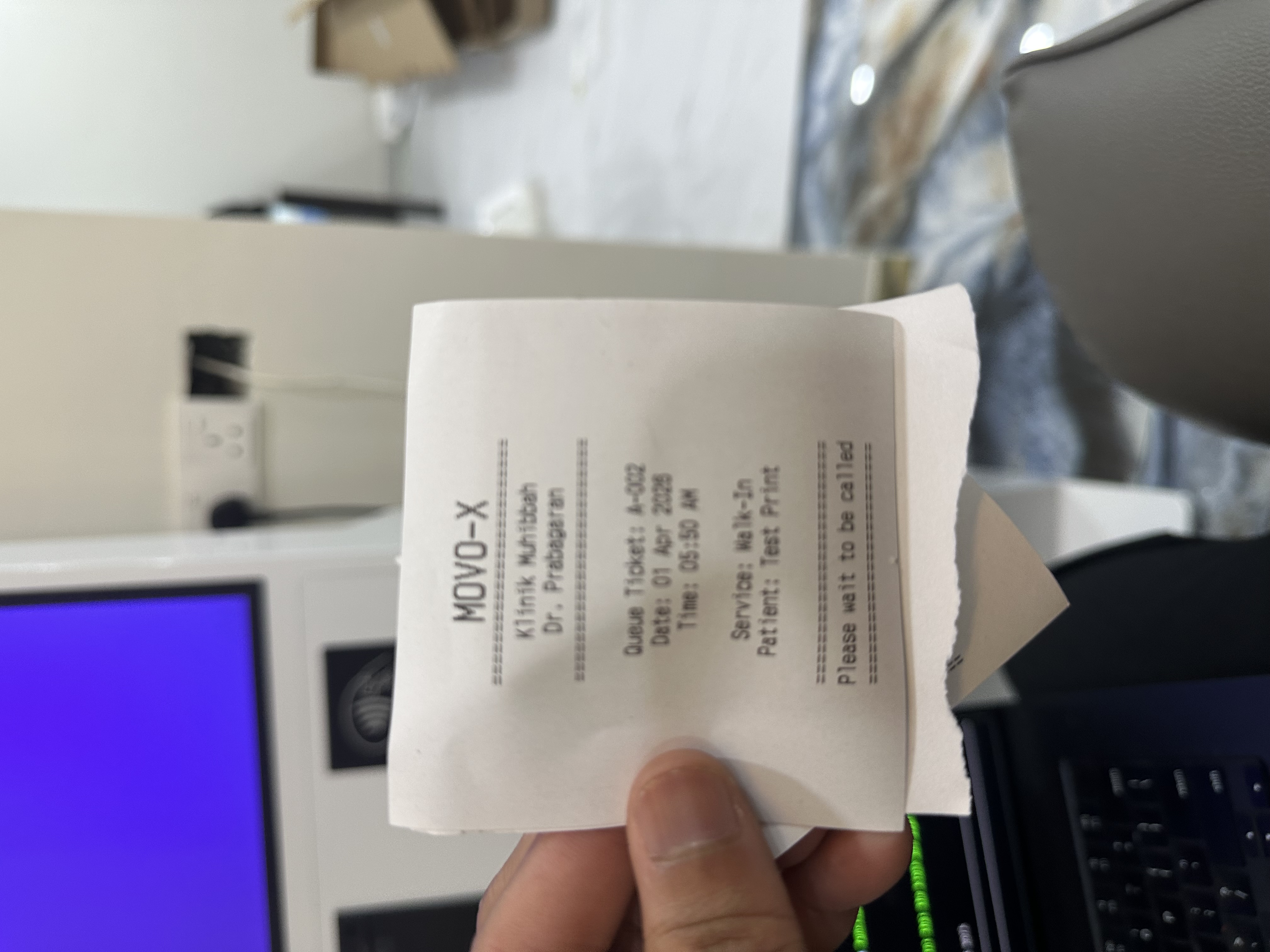 First MoVo-X receipt — Queue Ticket A-002, Klinik Muhibbah, Dr. Prabagaran