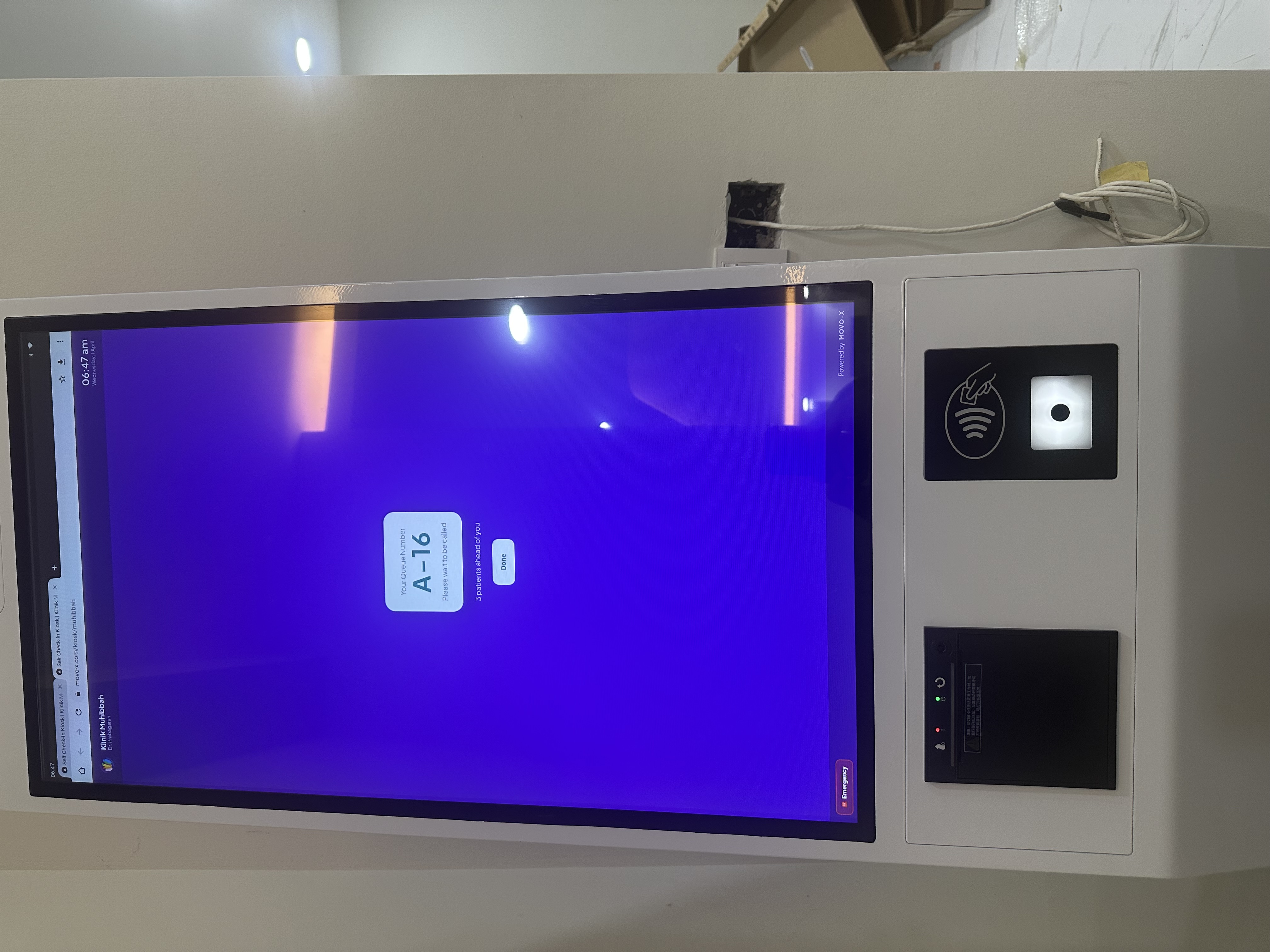 Kiosk screen showing queue ticket A-16