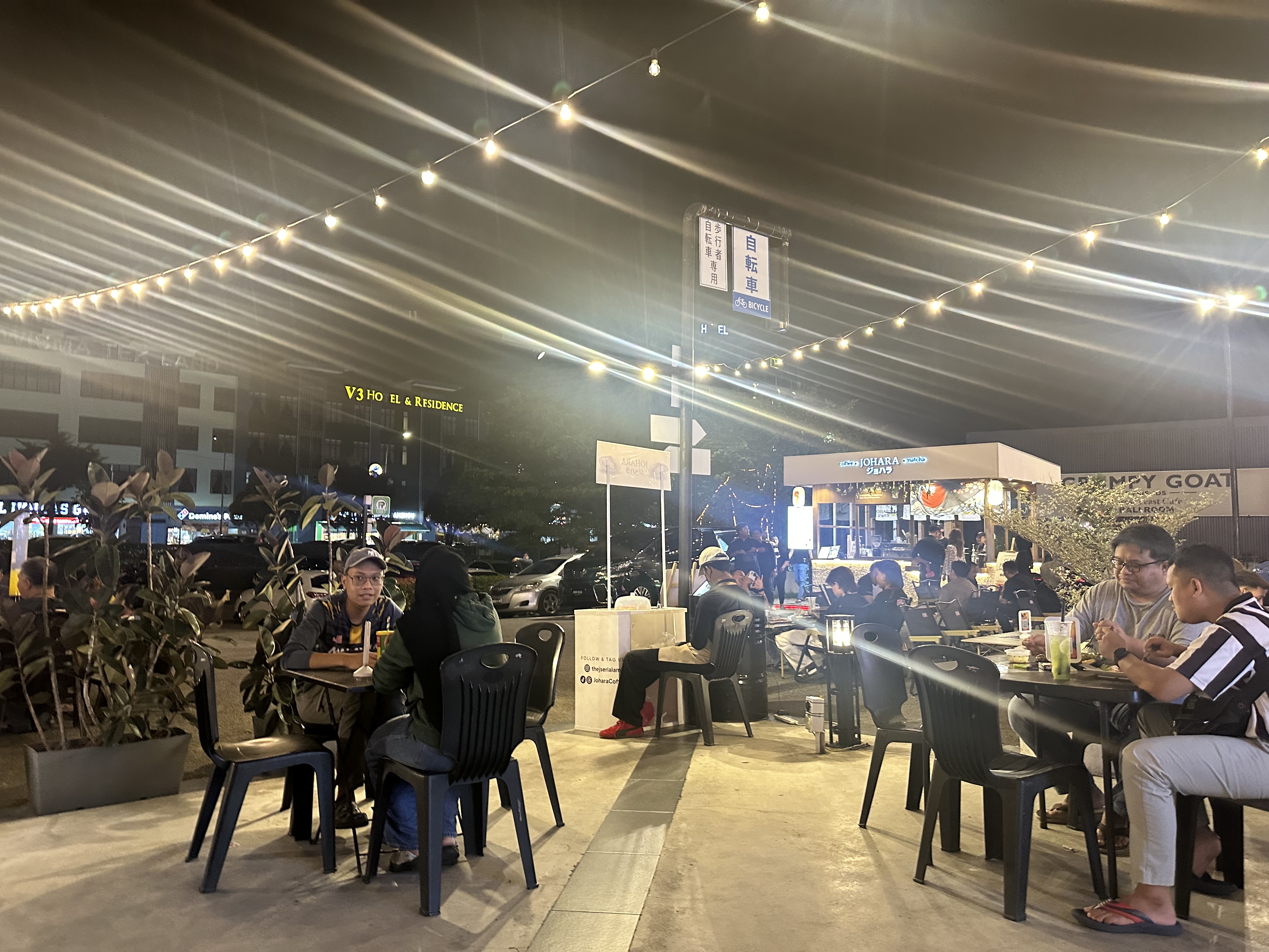 Outdoor dining at The J, V3 Hotel across the street, Grumpy Goat