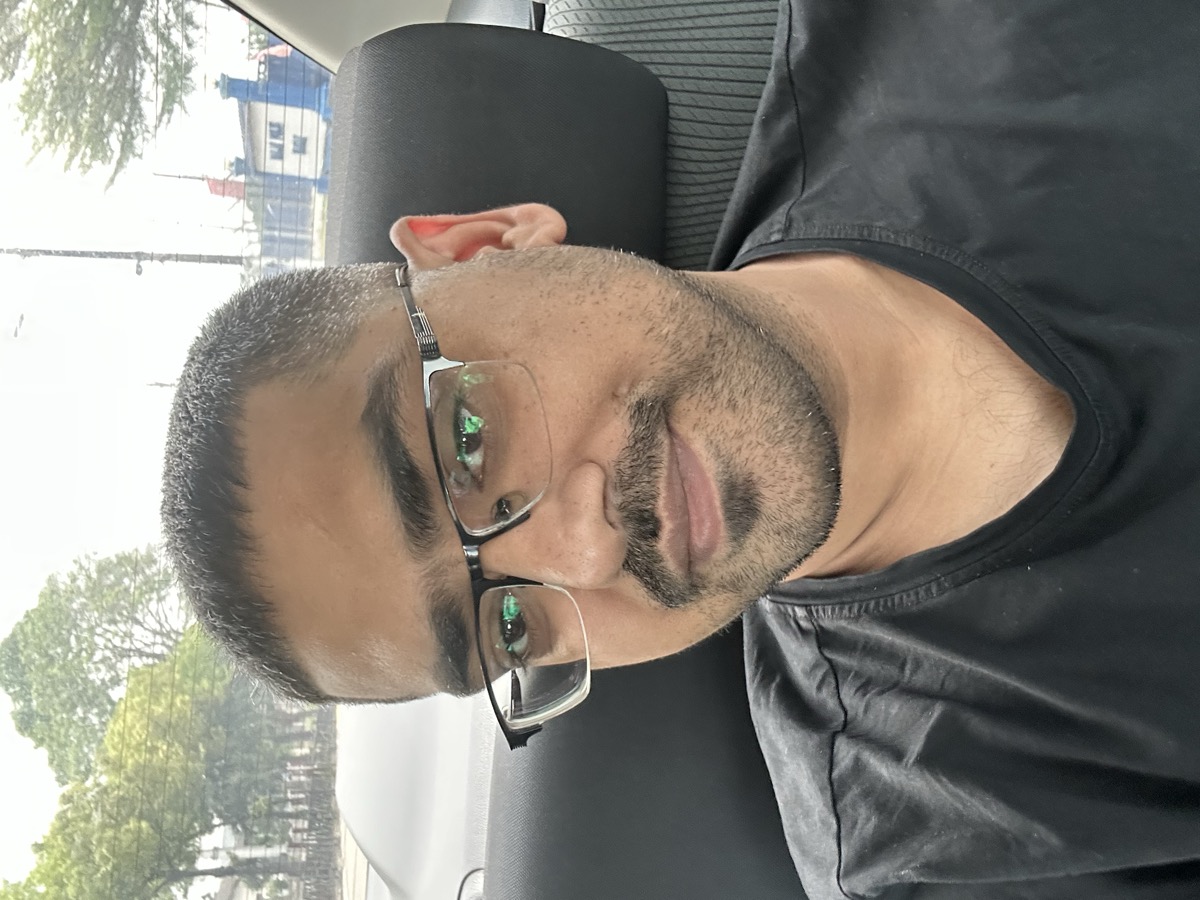Omer selfie in the car — glasses, JB afternoon