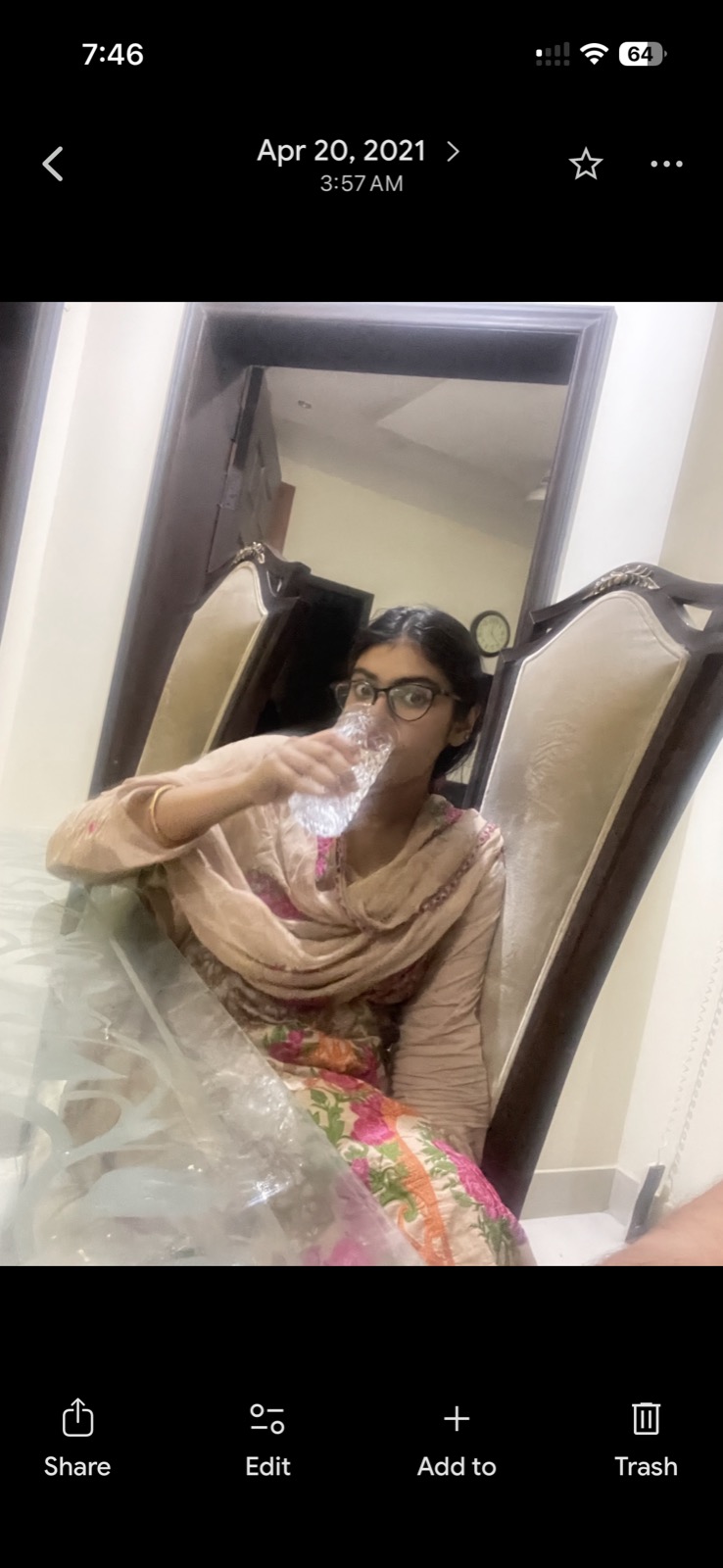 Maria drinking water at 3:57 AM — April 20, 2021 — first photo on new iPhone 12 Pro Max