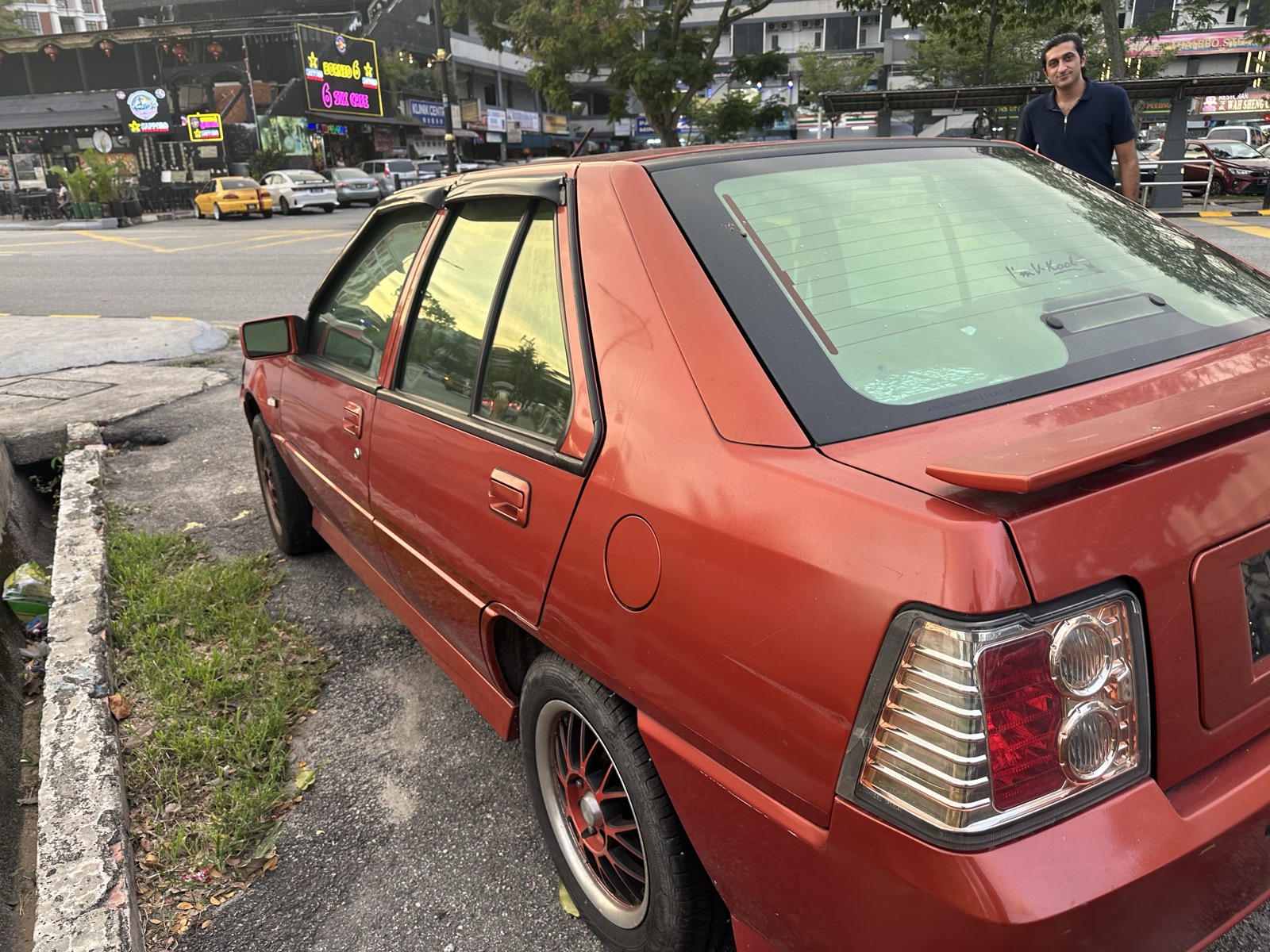 Admin visible behind the red Proton Saga