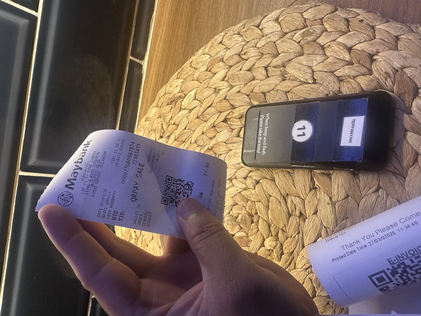 Receipt and phone at the table